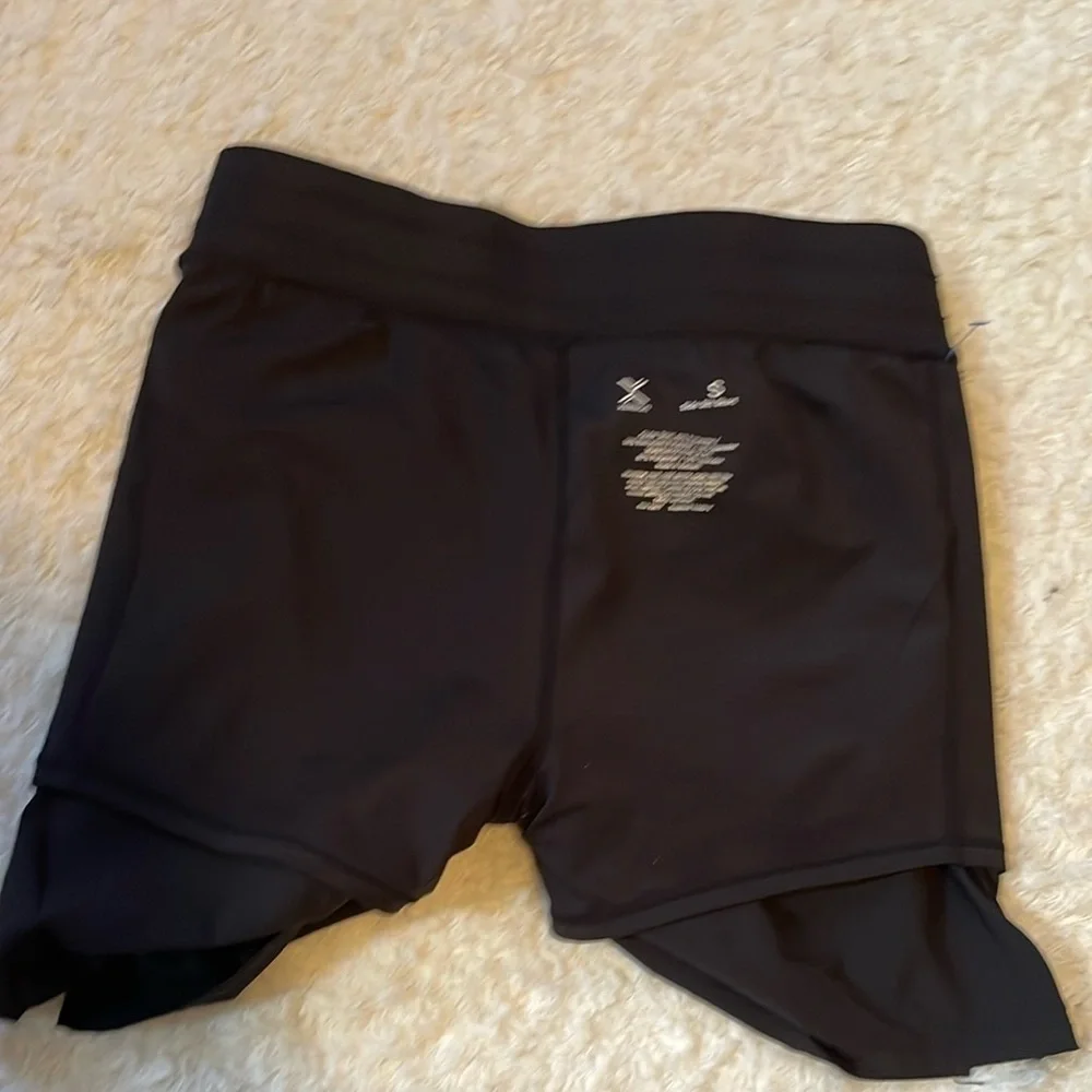 Xersion Black mini skirts and shorts
